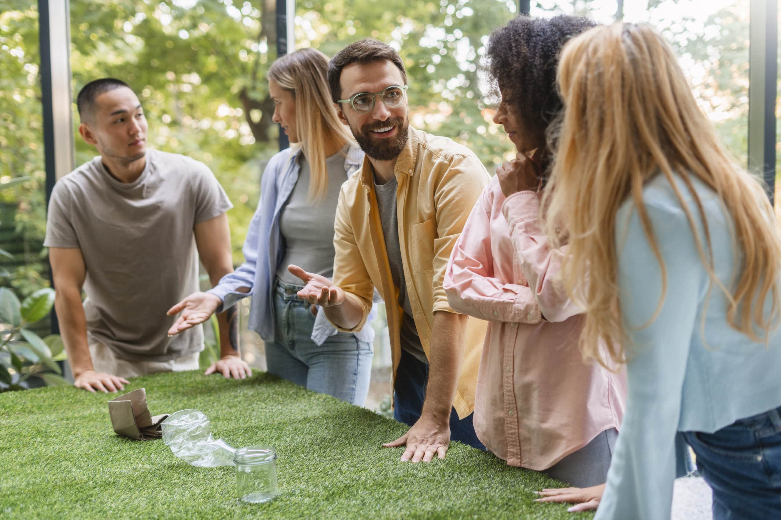 people working tech brand together